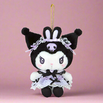 Plush keychain with black and white design on a white background