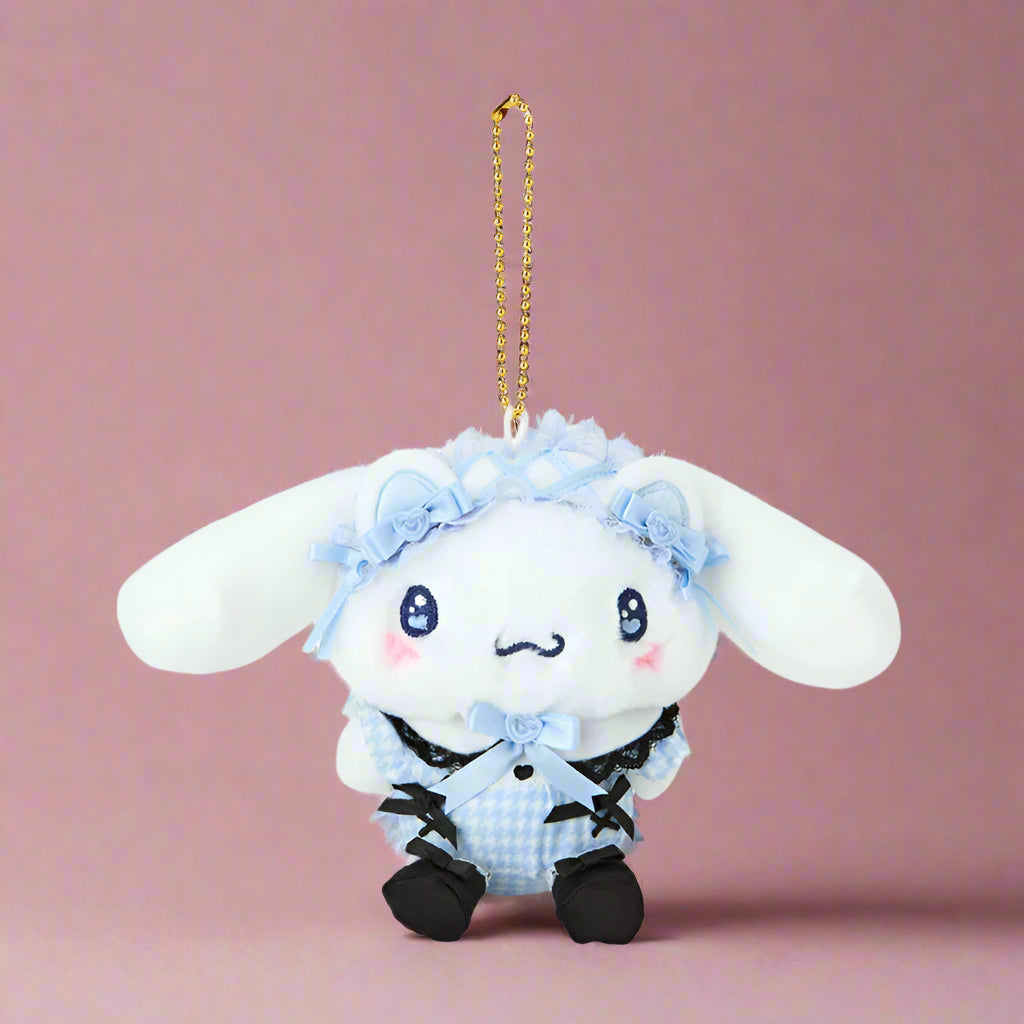 Plush keychain with a cute character design on a white background