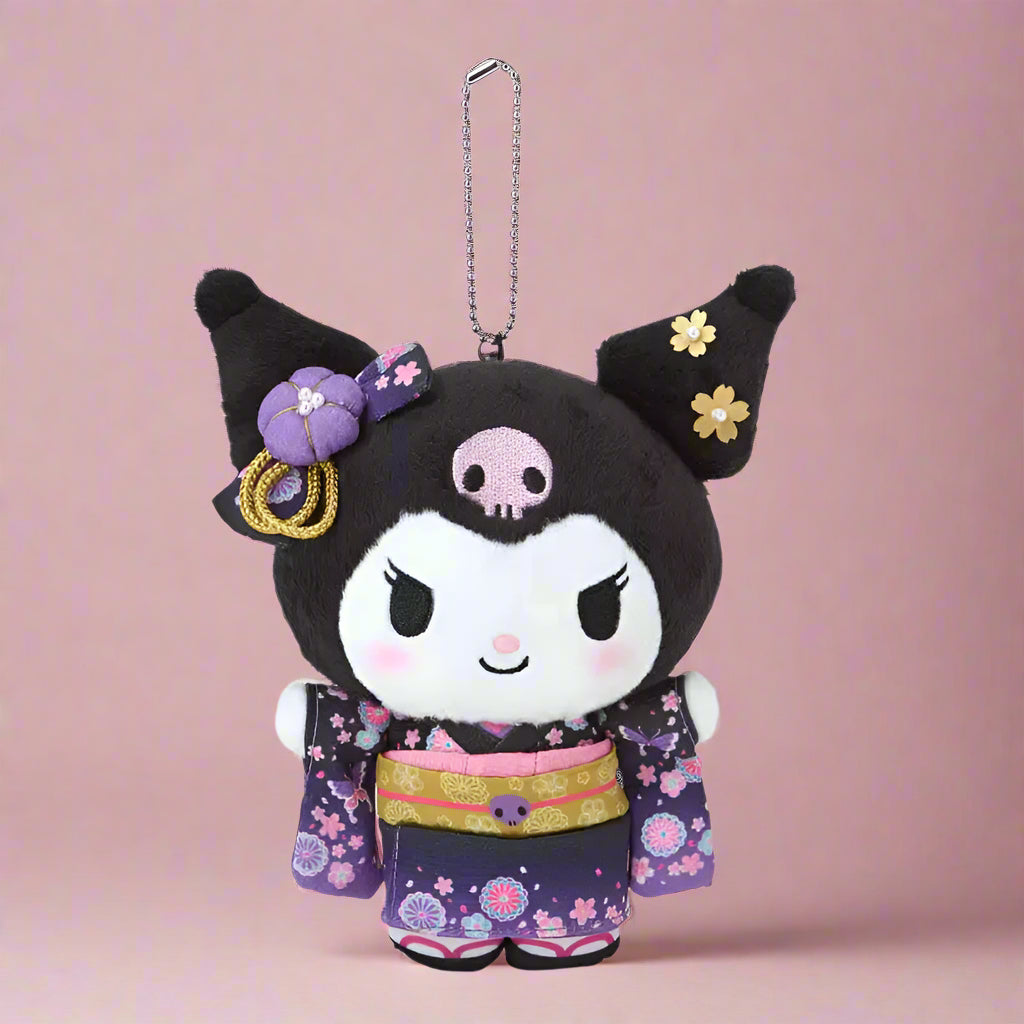 Plush keychain with black hair, pink face, and floral kimono on a white background
