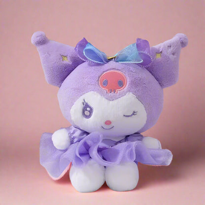 A collection of soft plush toy characters from Sanrio, including figures dressed in purple and pink outfits with bows and frills.