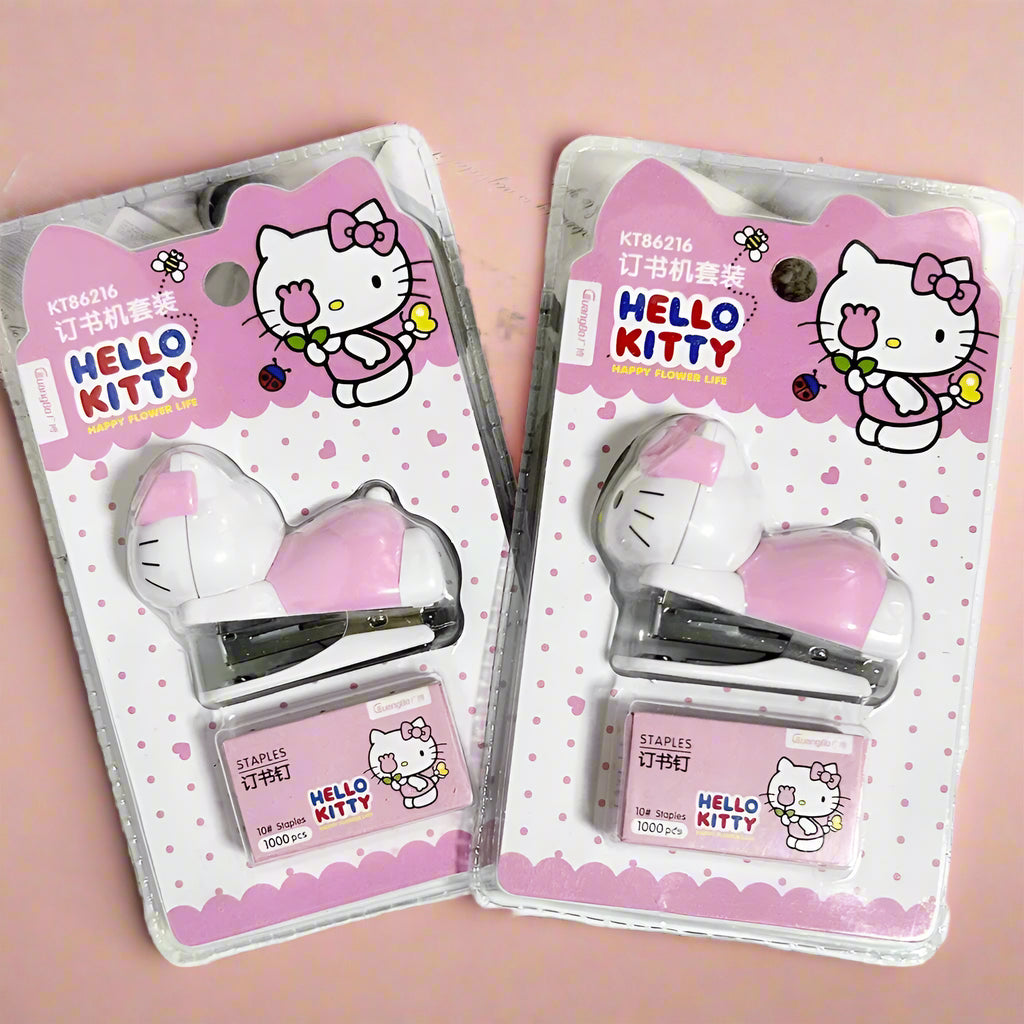Packaged Hello Kitty themed stapler sets, featuring the character in pink and white colors on the packaging, with the brand name 'Sanrio' visible.