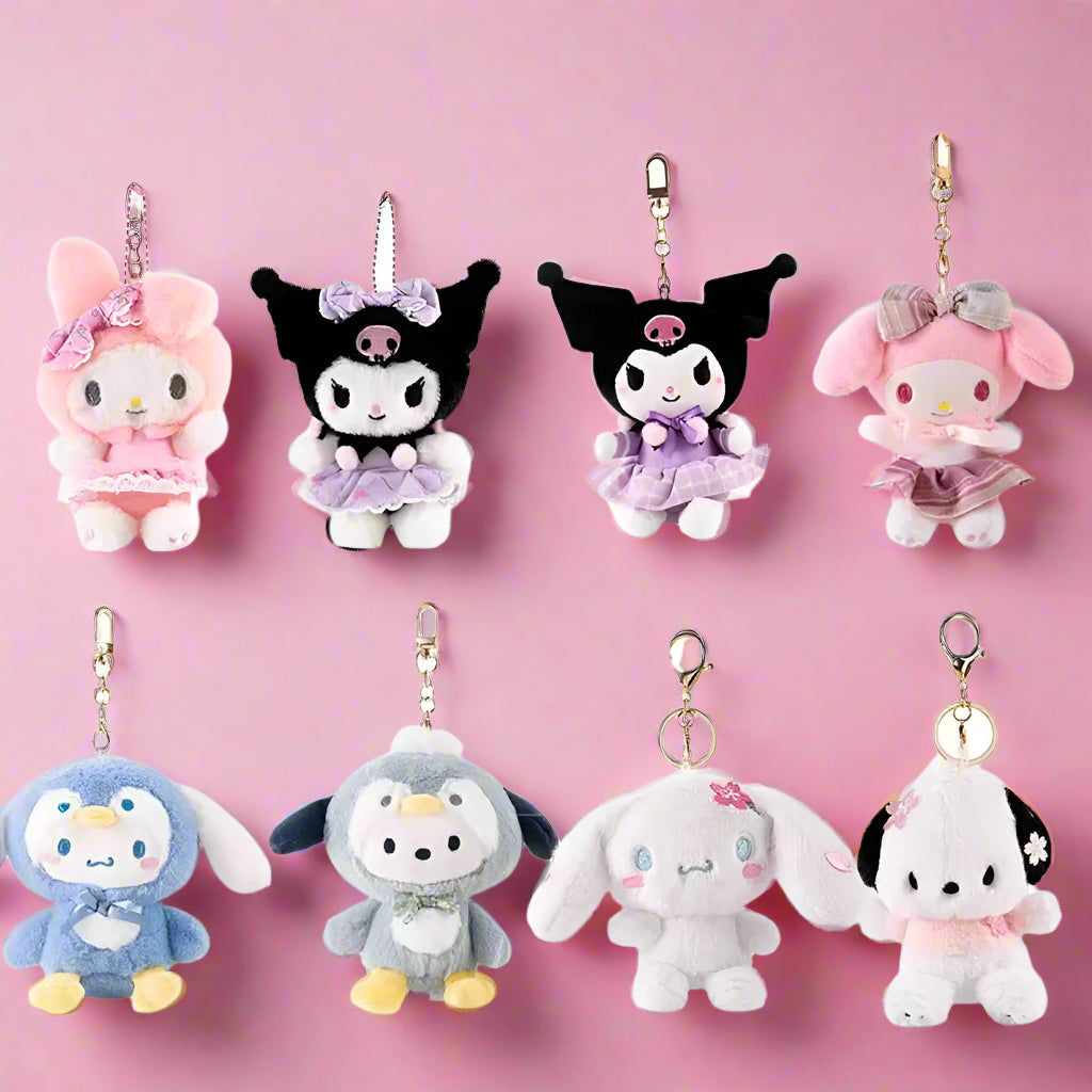 A collection of plush keychains featuring various Sanrio characters, including figures from the My Melody series and other related characters, dressed in colorful, pastel-colored outfits.