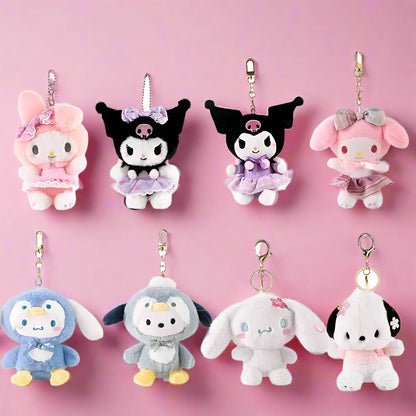 A collection of plush keychains featuring various Sanrio characters, including figures from the My Melody series and other related characters, dressed in colorful, pastel-colored outfits.