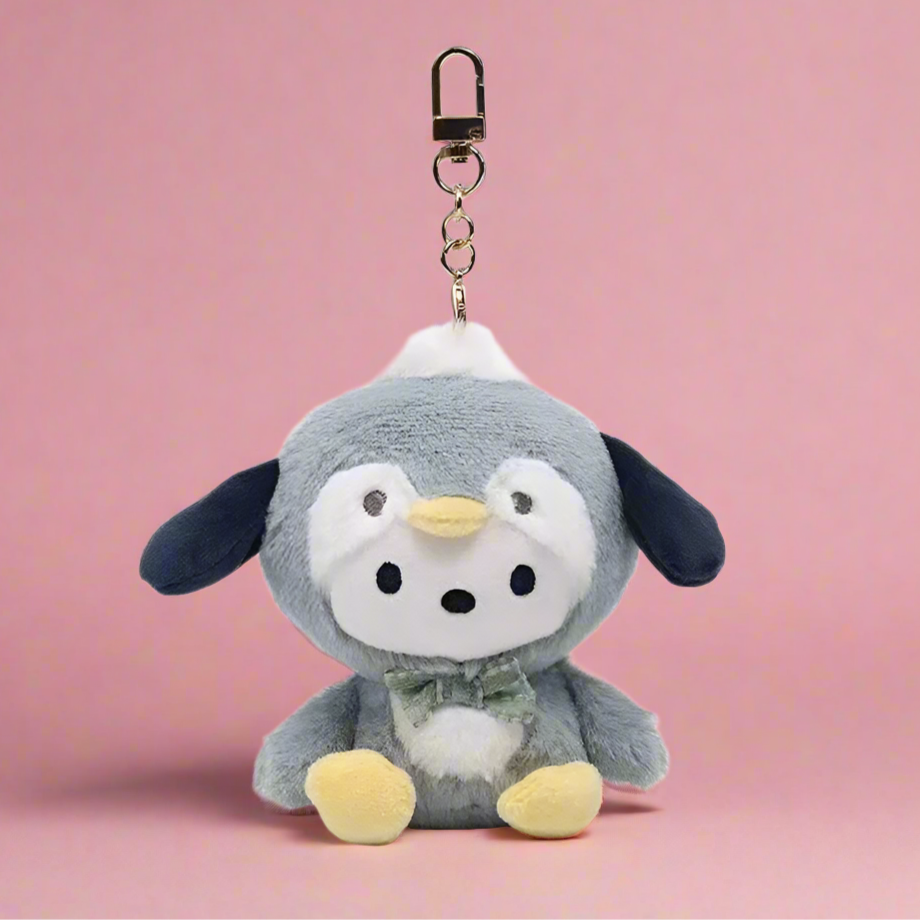 A collection of plush keychains featuring various Sanrio characters, including figures from the My Melody series and other related characters, dressed in colorful, pastel-colored outfits.