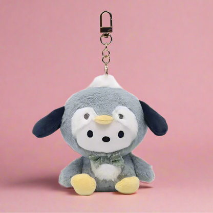 A collection of plush keychains featuring various Sanrio characters, including figures from the My Melody series and other related characters, dressed in colorful, pastel-colored outfits.