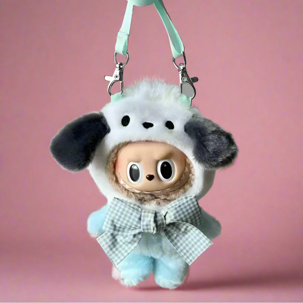 Plush toy dog character with a checkered outfit and green strap on a gray background