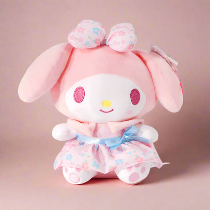 A collection of Sanrio characters plushies from the 'Peach Blossom' series, featuring soft pastel colors and floral patterns.