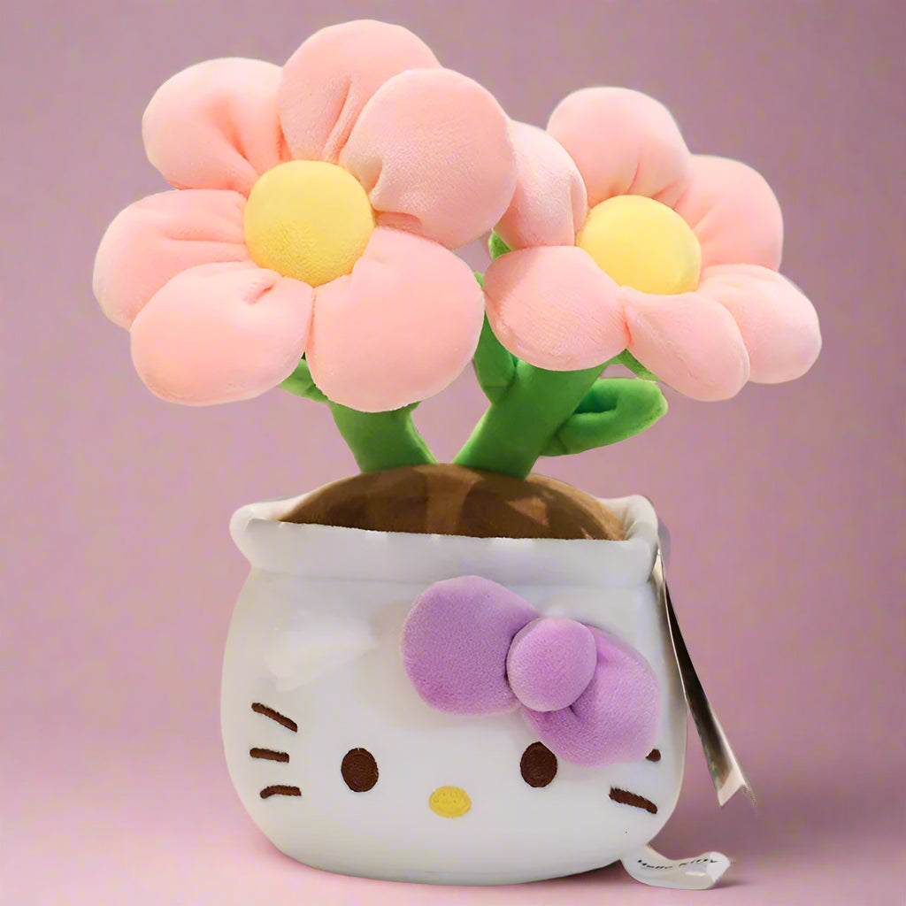 A plush flower bouquet with two flowers, one red and one pink, each with a Hello Kitty character design on the pot. The bouquet is displayed on a white grid surface.