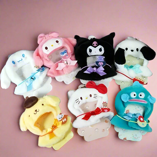 Set of colorful plush toys on a denim surface