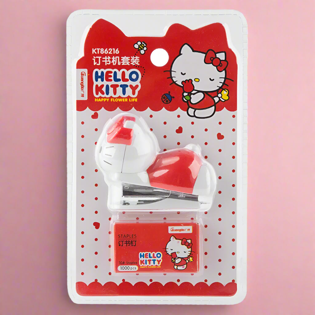 Packaged Hello Kitty themed stapler sets, featuring the character in pink and white colors on the packaging, with the brand name 'Sanrio' visible.
