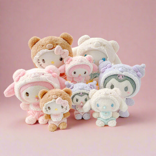 Collection of cute plush toys with animal hats on a white surface, branded 'Yoga Official'.