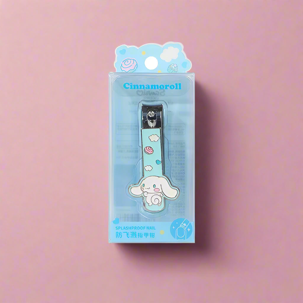 A collection of four nail-clippers with Sanrio characters designs, displayed against a pink and peach background.