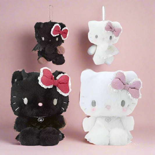 A set of Sanrio Hello Kitty plush toys and keychains from the 'Angel & Devil' Series. One plush is black with a red bow, and the other is white with a pink bow.
