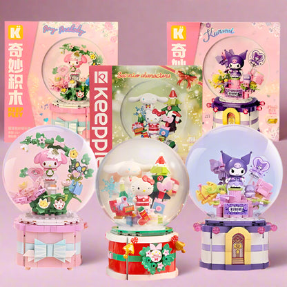A collection of Keeppley Sanrio building block sets featuring characters from Hello Kitty series, including Kuromi and My Melody. Each set includes a figurine inside a spherical block, with colorful and thematic accessories around them.