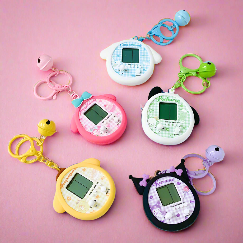 A collection of colorful Tamagachi Silicone Sanrio Protective Cases with various character designs.