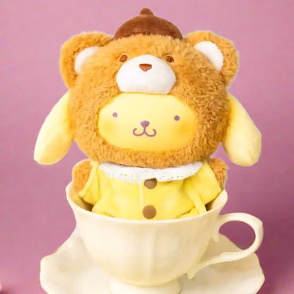 A collection of plush toys from the Sanrio Characters 'Velvet Plush Latte Baby' Series, featuring a bear character in various outfits and poses.